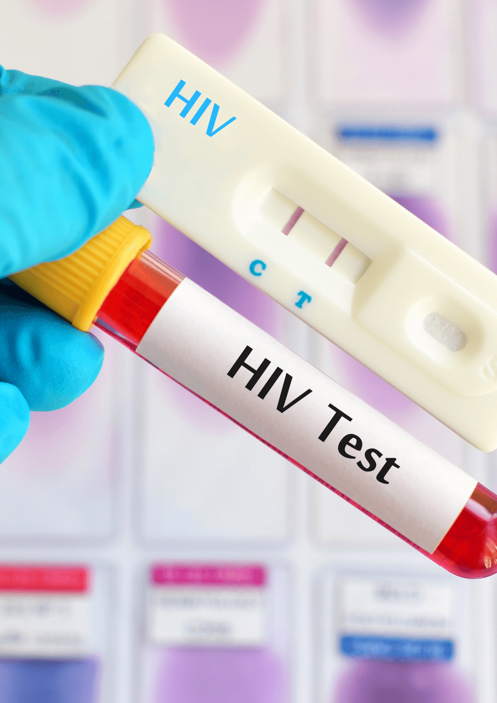 A gloved hand holding an HIV rapid test cassette beside a labelled blood sample tube.